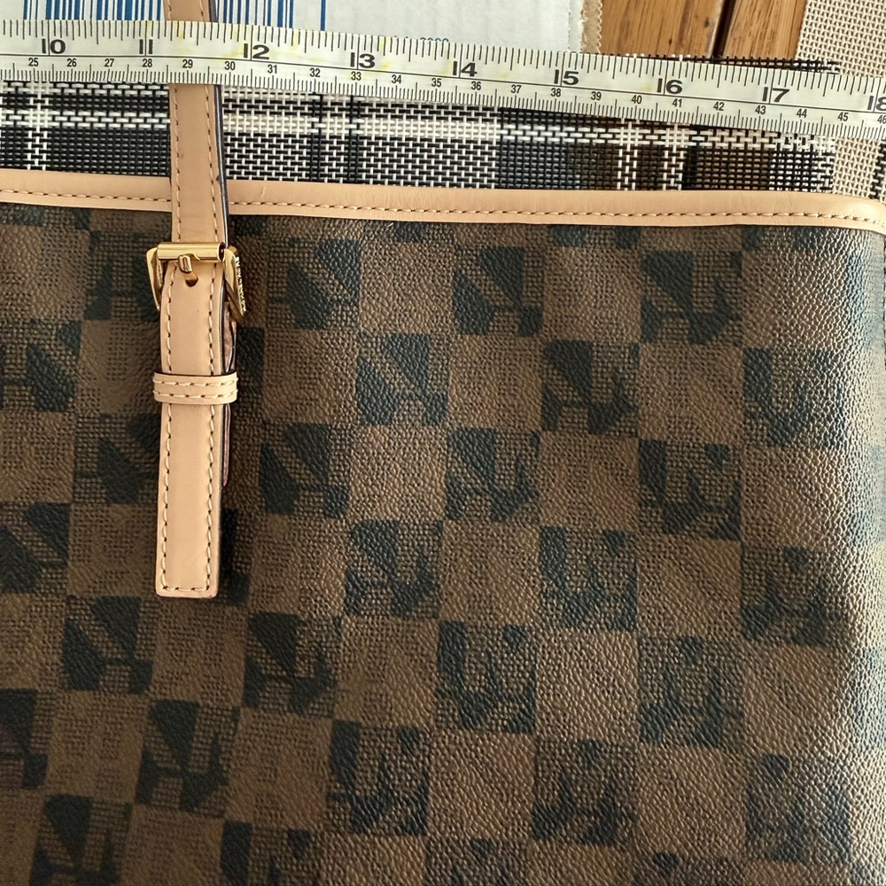 MICHAEL Michael Kors Jet Set travel tote in a brown checkered monogram pattern. - Picture 8 of 10